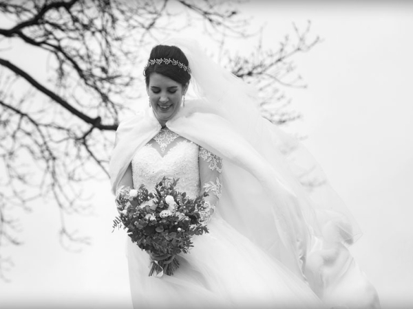 black and white bride holding bouquet, cheshire wedding photographer