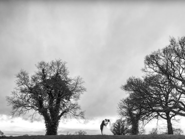 black and white countryside bride and groom kiss, cheshire wedding photographer