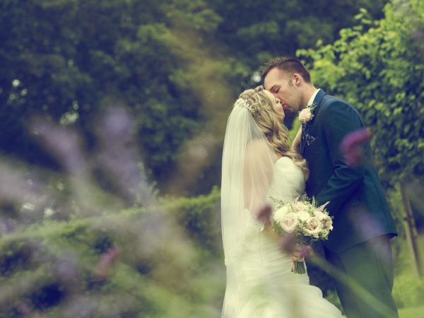bride and groom kiss outdoors, staffordshire wedding photographer, alrewas hayes weddings