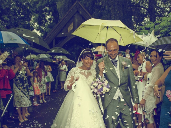 bride and groom confetti in the rain, staffordshire wedding photographer, heath house weddings