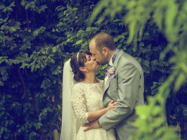 bride and groom kiss, staffordshire wedding photographer, heath house weddings