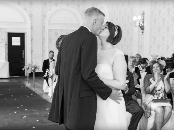 bride and groom first kiss, warwickshire wedding photographer, dunchurch park weddings
