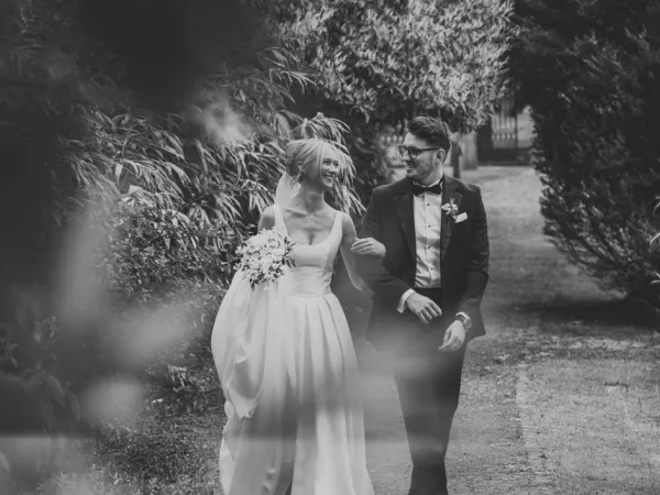 Natural wedding portrait of newlyweds in the gardens at Moddershall Oaks