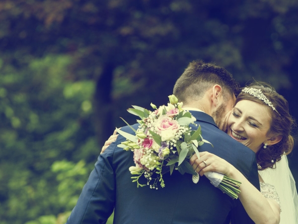 bride and groom hug, staffordshire wedding photographer, heath house weddings