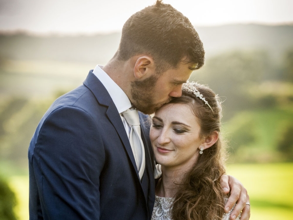 bride and groom countryside kiss, staffordshire wedding photographer, heath house weddings