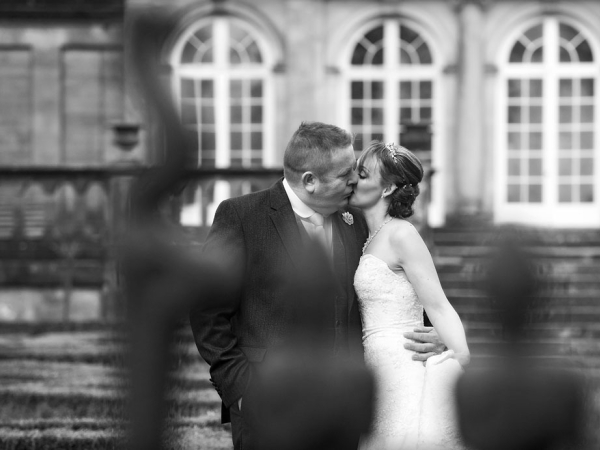 black and white bride and groom kiss, staffordshire wedding photographer, heath house weddings