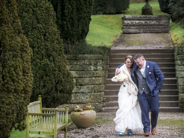 bride and groom walking, staffordshire wedding photographer, heath house weddings