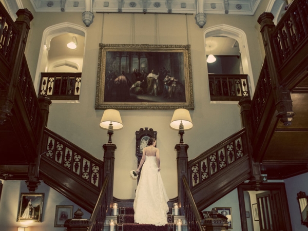 bride walking up a staircase, staffordshire wedding photographer, heath house weddings