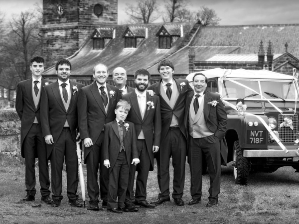 black and white groom and best man and land rover defender, cheshire wedding photographer