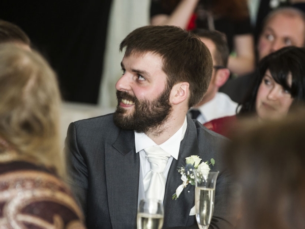 groom laughing at speeches, cheshire wedding photographer