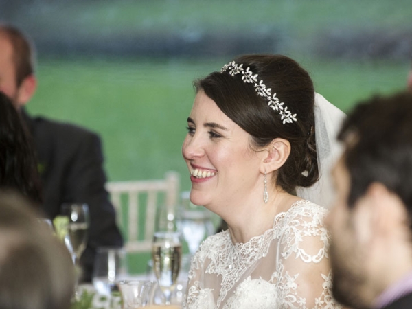 bride laughing at speeches, cheshire wedding photographer