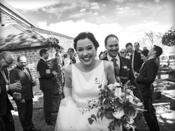 black and white bride and groom confetti, gloucestershire wedding photographer, cripps barn