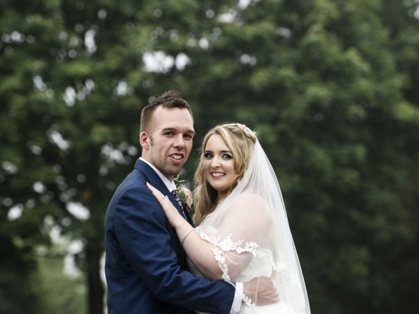 bride and groom looking at camera, staffordshire wedding photographer, alrewas hayes weddings