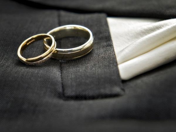 wedding rings on grooms suit, cheshire wedding photographer, crewe hall