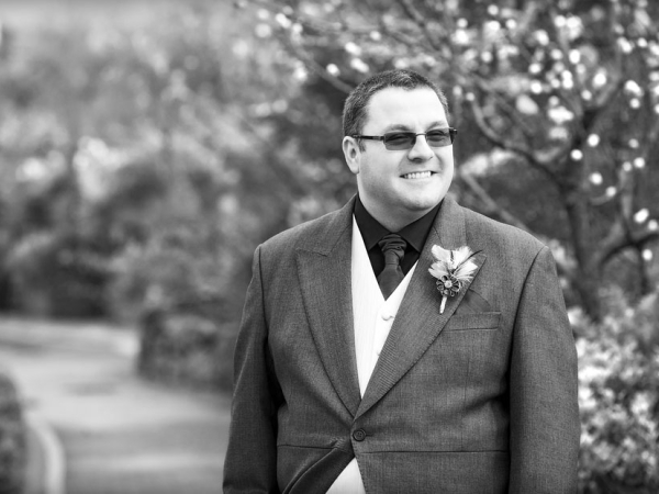 black and white groom in sunglasses, wedding photographer in wales