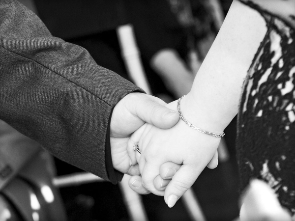 bride and groom hand holding, wedding photographer in wales