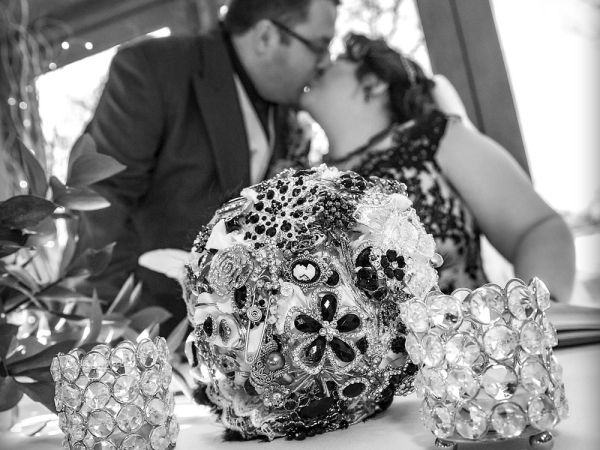 bride and groom kiss at registry, wedding photographer in wales