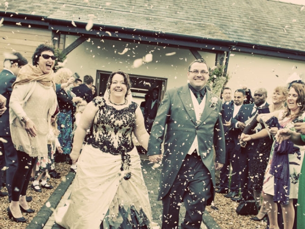 bride and groom, confetti, wedding photographer in wales
