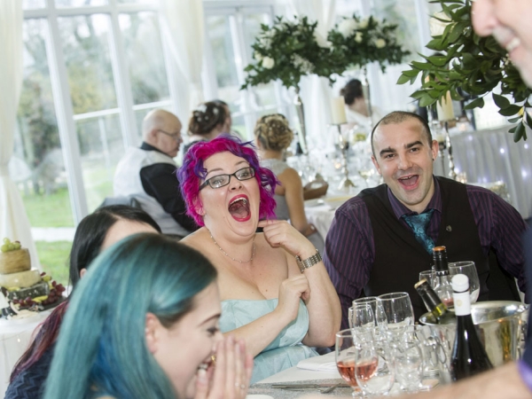 wedding magician, laughing, wedding photographer in wales