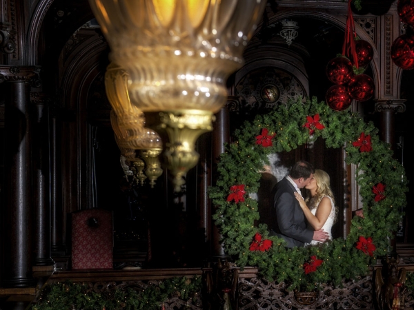 bride and groom kissing, roses, cheshire wedding photographer, crewe hall