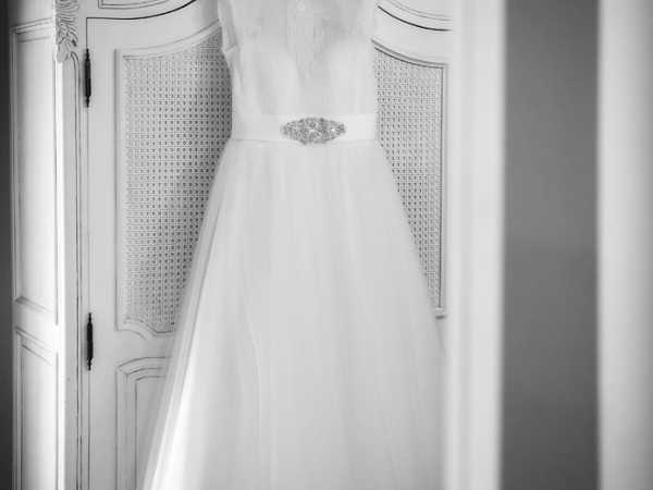 black and white wedding dress hanging up, cheshire wedding photographer, sandhole oak barn