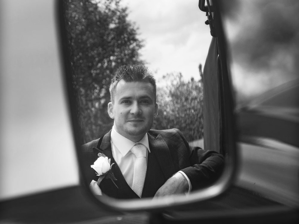 black and white groom reflection in car mirror, cheshire wedding photographer, sandhole oak barn