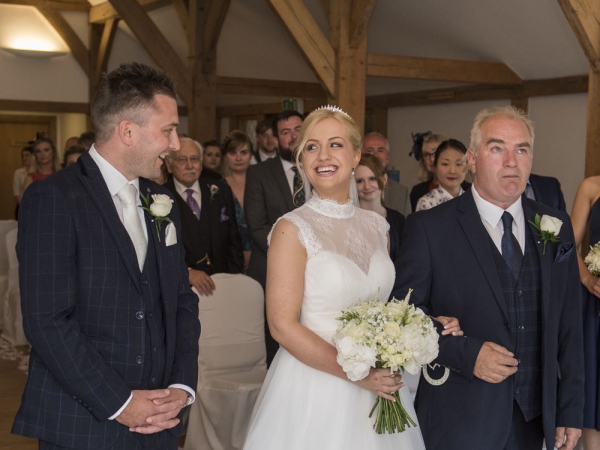 bride and groom saying their vows, cheshire wedding photographer, sandhole oak barn