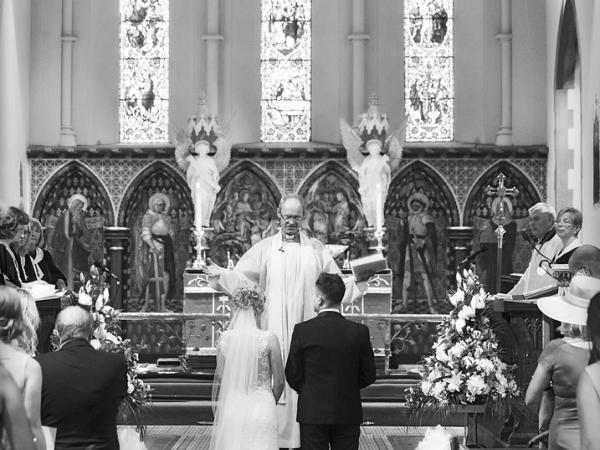 black and white church service, cheshire wedding photographer, all saints church thelwall