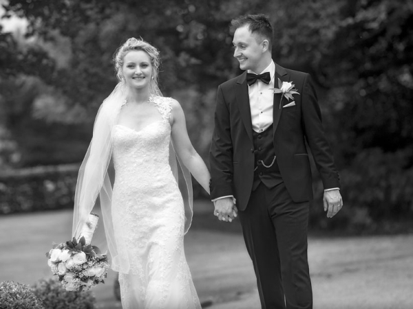 bride and groom holding hands, cheshire wedding photographer, statham lodge hotel