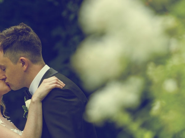 bride and groom kiss, cheshire wedding photographer, statham lodge hotel