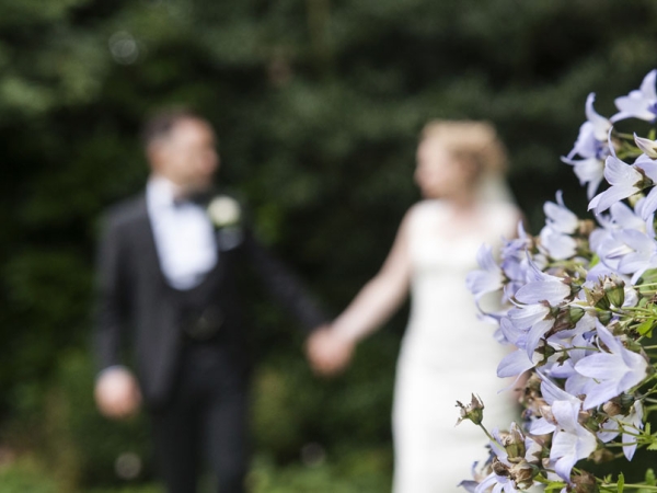bride and groom out of focus, cheshire wedding photographer, statham lodge hotel