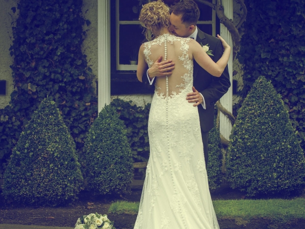 bride and groom embrace, cheshire wedding photographer, statham lodge hotel