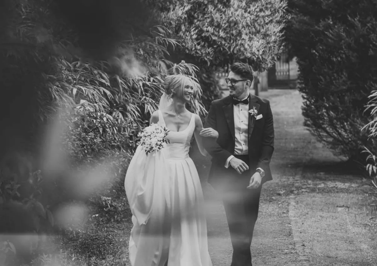 Natural wedding portrait of newlyweds in the gardens at Moddershall Oaks